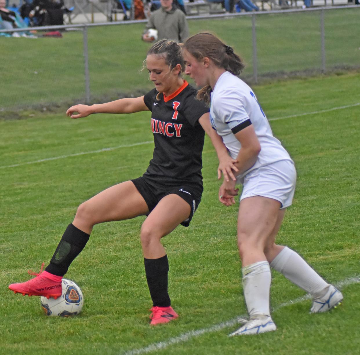 Quincy's Sami Hollenbaugh (1) shows off some fancy footwork versus Springport Monday