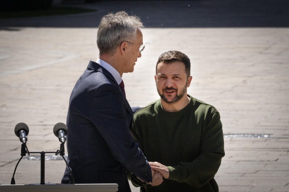 Ukrainian President Volodymyr Zelenskyy, right, welcomes NATO Secretary General Jens Stoltenberg during their meeting in Kyiv, Ukraine, Monday, April 29, 2024. (AP Photo/Efrem Lukatsky)