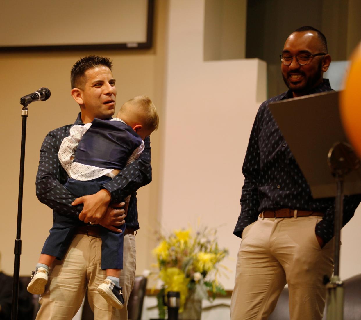 Isaiah and Joaquin Casados testify during their final adoption hearing on Nov. 18 for their son at Lubbock Impact as part of National Adoption Day.