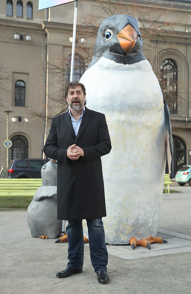 <p>The <em>Thy Kingdon Come</em> actor posed with a giant penguin from Greenpeace prior to a press conference on Tuesday in Berlin. Bardem has joined forces with the environmental organization to promote international legislation aimed at protecting the Antarctic. (Photo: Sean Gallup/Getty Images) </p>