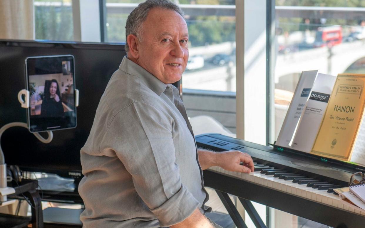 Brian Cohen having piano lesson from Genia via Zoom. He's an orthopaedic surgeon at the Kings Edward VII private hospital by day - Paul Grover/Paul Grover