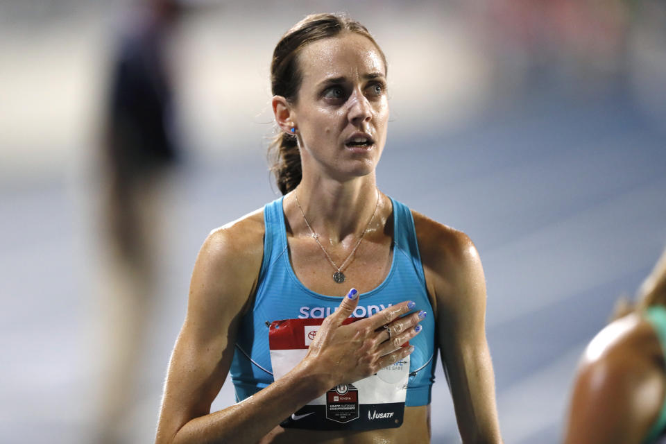 Molly Huddle reacts after winning the women's 10,000-meter run at the U.S. Championships athletics meet, Thursday, July 25, 2019, in Des Moines, Iowa. (AP Photo/Charlie Neibergall)