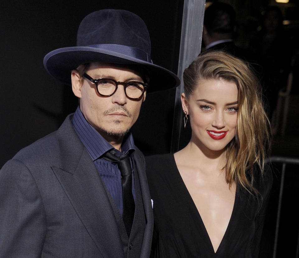 Johnny Depp y Amber Heard en el 2014.  (Photo by Gregg DeGuire/WireImage)