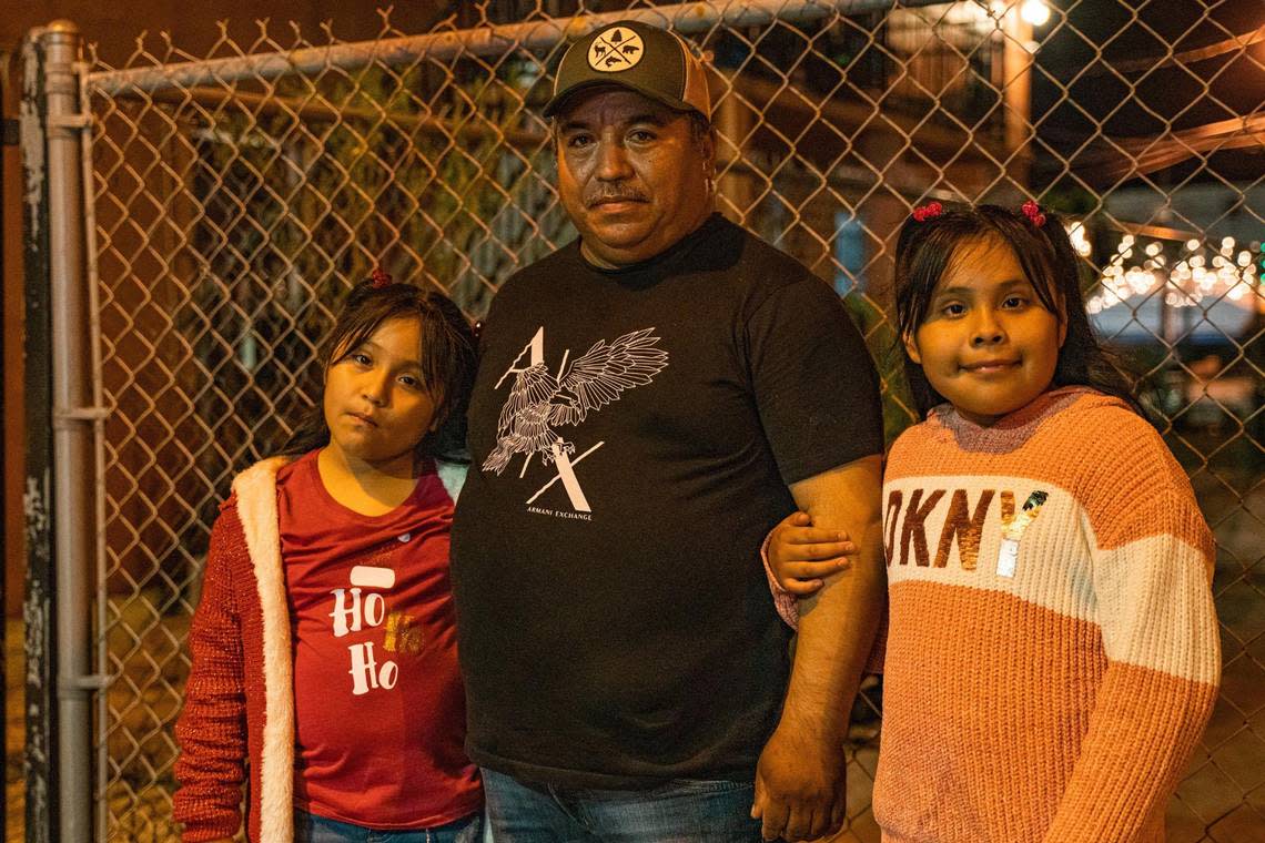 Catarino Arreguín and his daughters Abigail, left, 7, and Brenda, 8, live in Homestead, Florida.