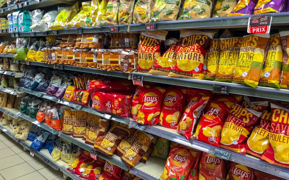 If you’re in a French supermarket, you’re just as likely to stumble across a bag of Tyrells as you are a French crisp offering - Directphoto Collection / Alamy
