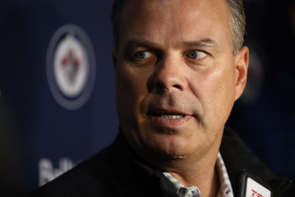 FILE - Winnipeg Jets general manager Kevin Cheveldayoff talks to media during the first day of the NHL training camp in Winnipeg, Manitoba on Sept. 13, 2019. The NHL decided Friday, Oct. 29, 2021, not to discipline former Chicago Blackhawks assistant general manager Kevin Cheveldayoff for his role in the club’s mishandling of sexual assault allegations made by a player in 2010. (John Woods/The Canadian Press via AP, File)