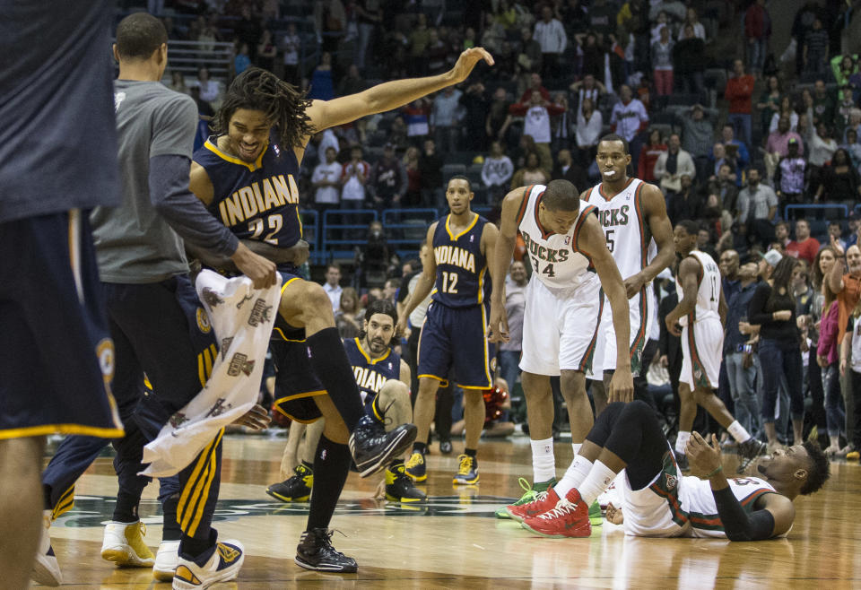 Indiana Pacers' Chris Copeland (22) reacts after sinking a game-winning shot against the Milwaukee Bucks during the second half of an NBA basketball game on Wednesday, April 9, 2014, in Milwaukee. The Pacers defeated the Bucks 104-102. (AP Photo/Tom Lynn)