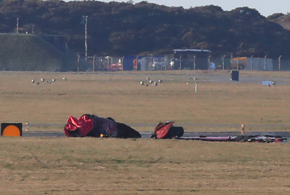 <em>Wreckage of the jet can be seen on the ground at RAF Valley (PA)</em>