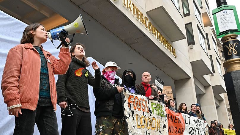 Hundreds of climate activists have gathered outside the hotel where the Energy Intelligence Forum is taking place.