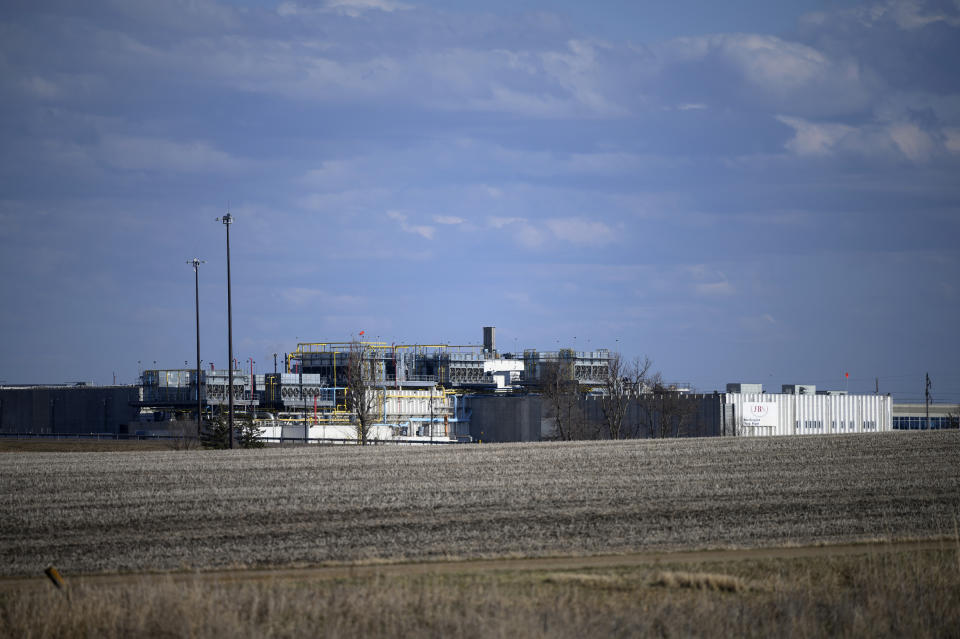 FILE - This April 18, 2020, file photo, shows the JBS USA Pork Plant in Worthington, Minn. Federal recommendations meant to keep meatpacking workers safe as they return to plants that were shuttered by the coronavirus have little enforcement muscle behind them, fueling anxiety that working conditions could put employees' lives at risk. Major meatpackers JBS, Smithfield and Tyson have said worker safety is their highest priority. (Aaron Lavinsky/Star Tribune via AP)