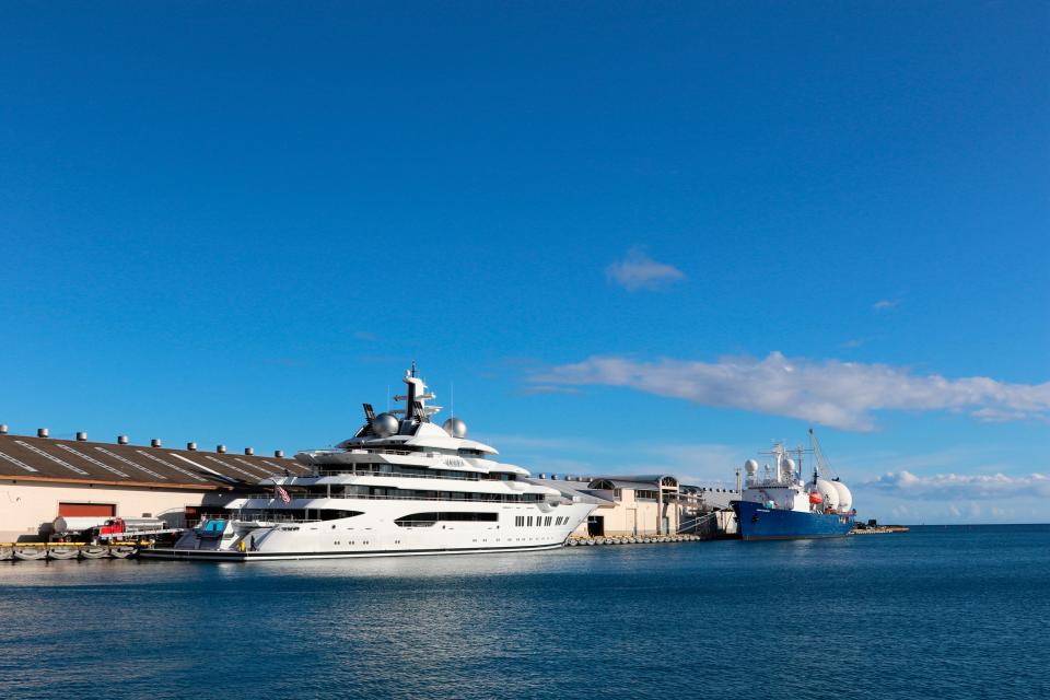 The superyacht Amadea is moored in Honolulu on Thursday, June 16, 2022. A Russian-owned superyacht seized by the United States arrived in Honolulu Harbor flying a U.S. flag after the U.S. last week won a legal battle in Fiji to take the $325 million vessel.