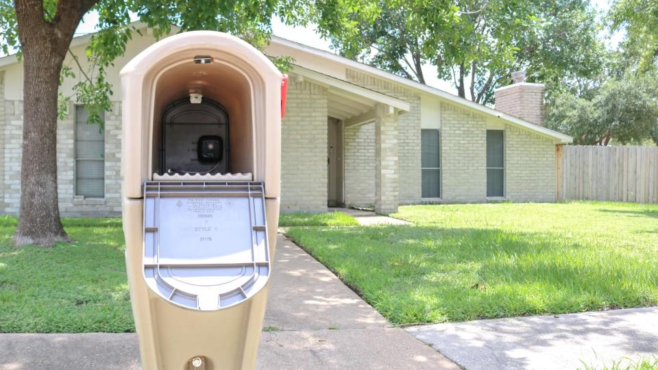 The Ring Mailbox Sensor installed in the back of a mailbox