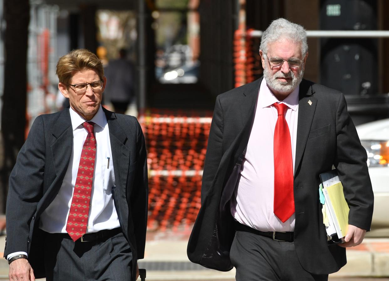 Self-proclaimed "Annuity King" Phillip Roy Wasserman of Sarasota, right, and his attorney, William Sansone, walk to the Sam M. Gibbons Federal Courthouse in Tampa on Wednedsay, Jan. 31, 2024 for a sentencing hearing. Wasserman was found guilty on nine felony counts including wire fraud and mail fraud, as well as conspiracy to commit wire and mail fraud, in connection with FastLife, an online life, health and annuity market firm he started.