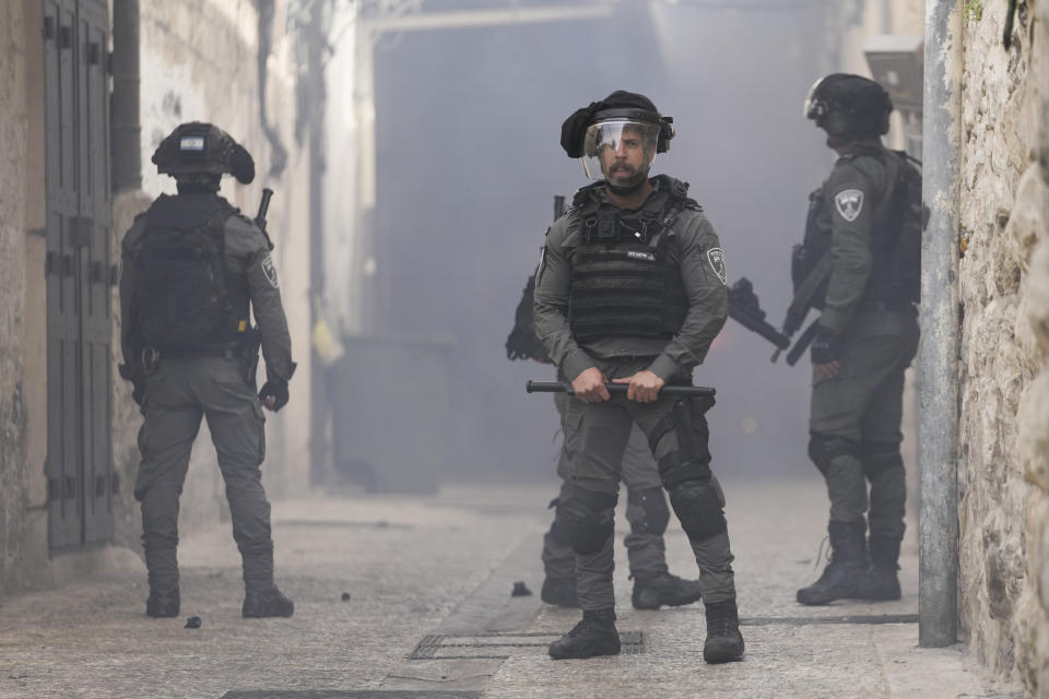 Israeli police is deployed in the Old City of Jerusalem, Sunday, April 17, 2022. Israeli police clashed with Palestinians outside Al-Aqsa Mosque after police cleared Palestinians from the sprawling compound to facilitate the routine visit of Jews to the holy site and accused Palestinians of stockpiling stones in anticipation of violence. (AP Photo/Mahmoud Illean)