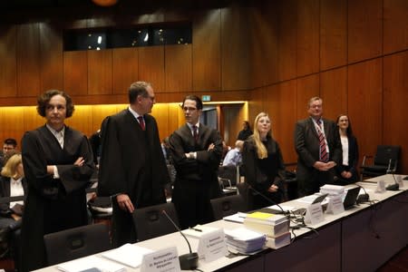 Lawyers prepare before the start of a hearing over the VW diesel emissions cheating scandal, in Braunschweig