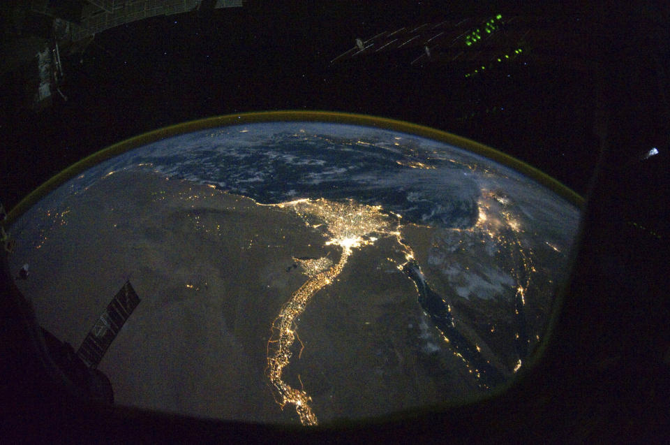 A night time photograph made by an International Space Station Expedition 25 crewmember shows the bright lights of Cairo and Alexandria, Egypt on the Mediterranean coast as well as the Nile River and its delta which stand out clearly in this image released by NASA and taken October 28, 2010. REUTERS/NASA (UNITED STATES - Tags: SCI TECH) FOR EDITORIAL USE ONLY. NOT FOR SALE FOR MARKETING OR ADVERTISING CAMPAIGNS. THIS IMAGE HAS BEEN SUPPLIED BY A THIRD PARTY. IT IS DISTRIBUTED, EXACTLY AS RECEIVED BY REUTERS, AS A SERVICE TO CLIENTS