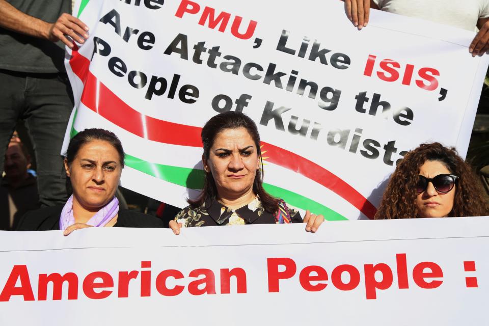 Kurds from Kirkuk stage a protest in front of the U.S. Consulate in Irbil, the capital of Kurdistan Region, Iraq, Oct. 20, 2017. The protesters hold banners reading “Kurds are under attack by Shiite Hashd al Shaabi militants using American weapons.” Iraqi forces and Shiite-led pro-government Hashd al Shaabi militias moved to reclaim control over Kirkuk from the local Kurdish authority following the Sept. 25 independence referendum in Kurdistan. (Photo: Gailan Haji/EPA-EFE/REX/Shutterstock)