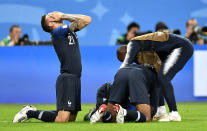 <p>France’s Lucas Hernandez, left, celebrates after his team advanced to the final after the semifinal match between France and Belgium at the 2018 soccer World Cup in the St. Petersburg Stadium in St. Petersburg, Russia, Tuesday, July 10, 2018. (AP Photo/Martin Meissner) </p>