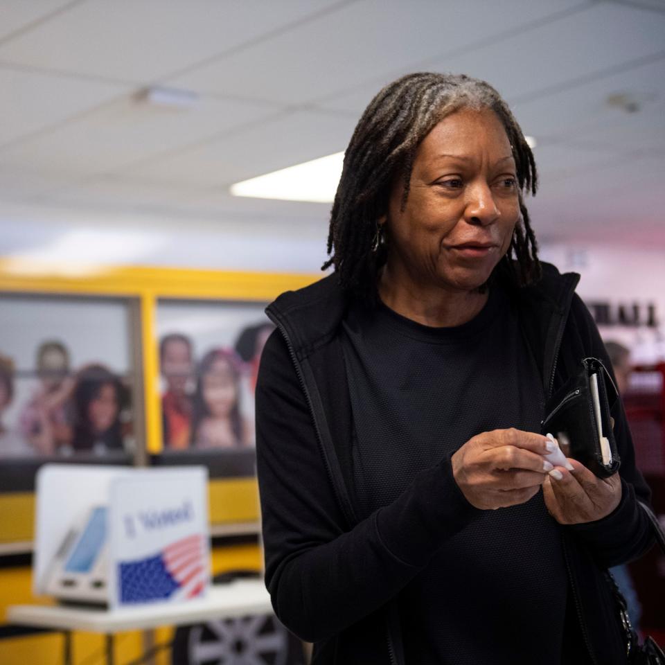 Shirley Timmons receives her I voted sticker at the Whitehall Elementary School precinct during the Democratic primary election in Anderson, S.C., on Saturday, Feb. 3, 2024.