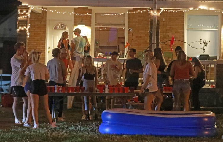 Off-campus yard and porch parties were packed Aug. 20 near Ohio State University. Few masks were visible. A mix of online and in-person classes began Aug. 25 at the Columbus campus.