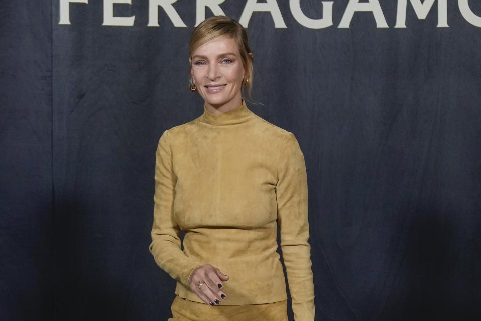 Uma Thurman arrives for the Ferragamo women's Fall-Winter 2023-24 collection presented in Milan, Italy, Saturday, Feb. 25, 2023. (AP Photo/Luca Bruno)