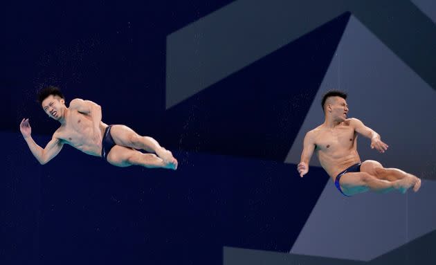 Jul 28, 2021; Tokyo, Japan; Sho Sakai and Ken Terauchi (JPN) in the men's 3m springboard synchronized diving competition during the Tokyo 2020 Olympic Summer Games at Tokyo Aquatics Centre. Mandatory Credit: Grace Hollars-USA TODAY Sports (Photo: Grace Hollars / USA TODAY Sports/Reuters)