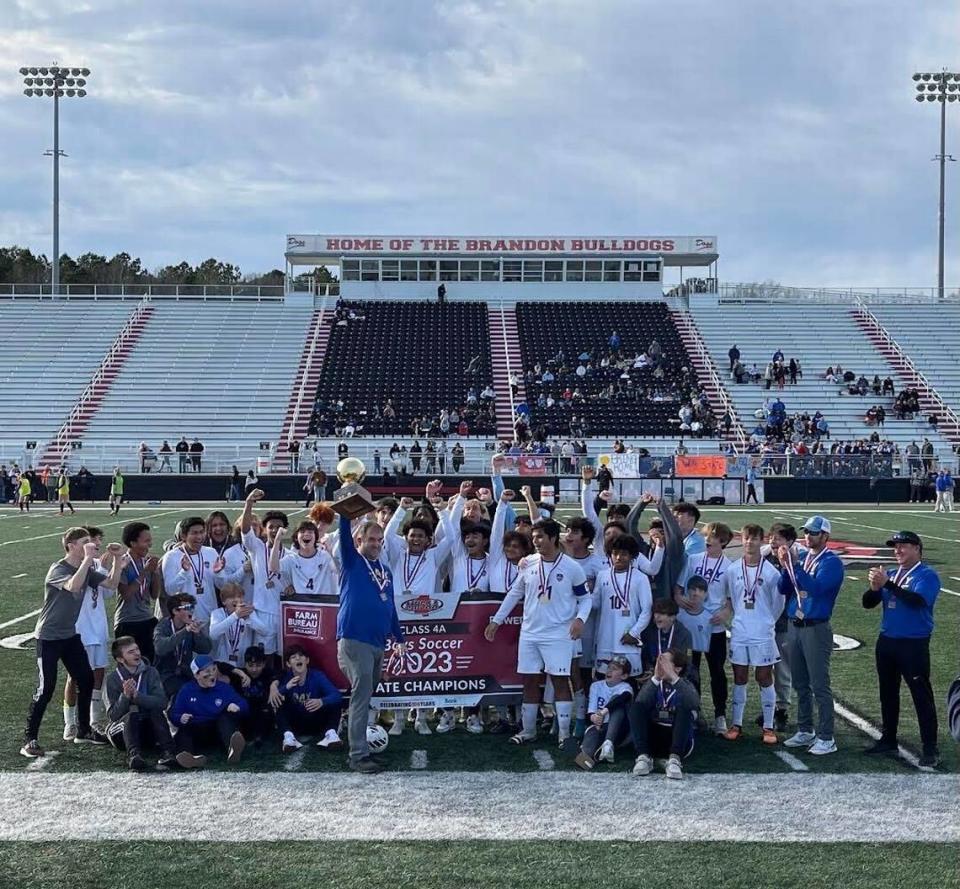 The Bay High boy’s soccer team poses after winning the 2023 4A state championship in Brandon, Mississippi.