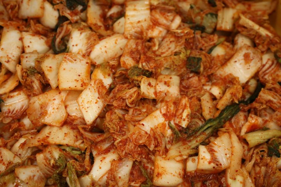 Kimchi that is waiting in barrels to be jarred at the Bing Gre Kimchi factory in Prospect Park.