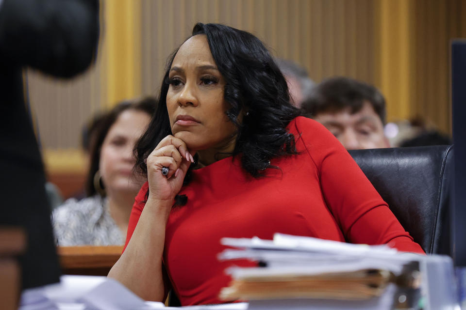 Fulton County District Attorney Fani Willis looks on during a hearing on the Georgia election interference case, Friday, March, 1, 2024, in Atlanta. The hearing is to determine whether Fulton County District Attorney Fani Willis should be removed from the case because of a relationship with Nathan Wade, special prosecutor she hired in the election interference case against former President Donald Trump. (AP Photo/Alex Slitz, Pool)