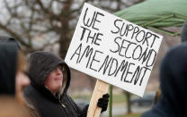 <p>A rally attendee listens to a speaker during a gun-rights rally at the state capitol, Saturday, April 14, 2018, in Des Moines, Iowa. (Photo: Charlie Neibergall/AP) </p>