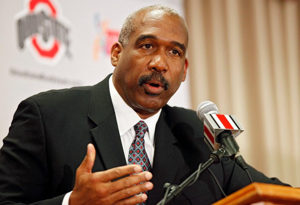 Ohio State athletic director Gene Smith answers questions at a news conference in 2011.