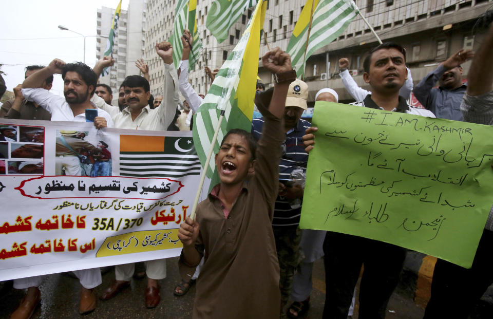Supporters of a religious group Anjum-e-Tulba Islam chant anti-India slogans during a demonstration to condemn India and its decisions on Kashmir, in Karachi, Pakistan, Saturday, Aug. 10, 2019. Pakistan says that with the support of China, it will take up India's unilateral actions in the disputed region of Kashmir with the U.N. Security Council and may approach the U.N. Human Rights Commission over what it says is the "genocide" of the Kashmiri people. (AP Photo/Fareed Khan)