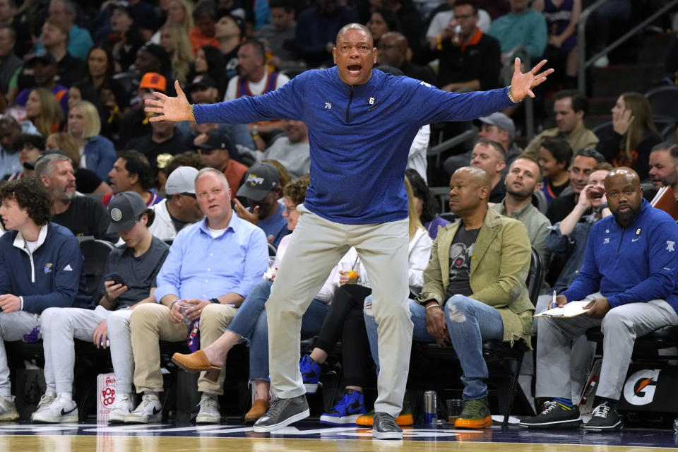 Philadelphia 76ers coach Doc Rivers reacts to a foul call during the second half of the team's NBA basketball game against the Phoenix Suns, Saturday, March 25, 2023, in Phoenix. The Suns won 125-105. (AP Photo/Rick Scuteri)