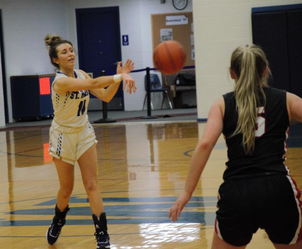 Macey Bebble passes the ball during a matchup between St. Mary's and Bellaire on Wednesday, February 2.