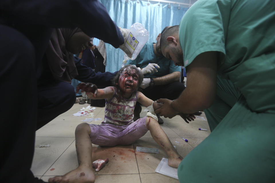 Palestinians wounded in the Israeli bombardment of the Gaza Strip arrive at al-Aqsa Hospital in Deir al-Balah, central Gaza Strip, Saturday, June 8, 2024. (AP Photo/Ismael Abu Dayyah)