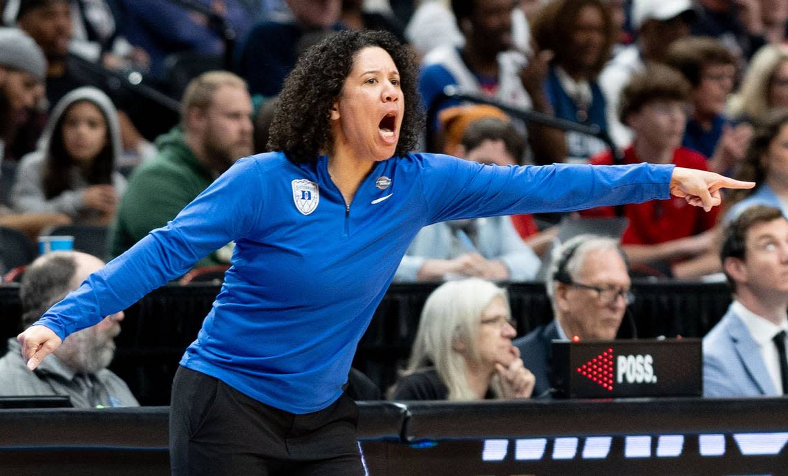 Duke coach Kara Lawson shouts instructions to her Blue Devils as the face UConn in NCAA Tournament Sweet 16 action in Portland, Saturday night, March 30, 2024.