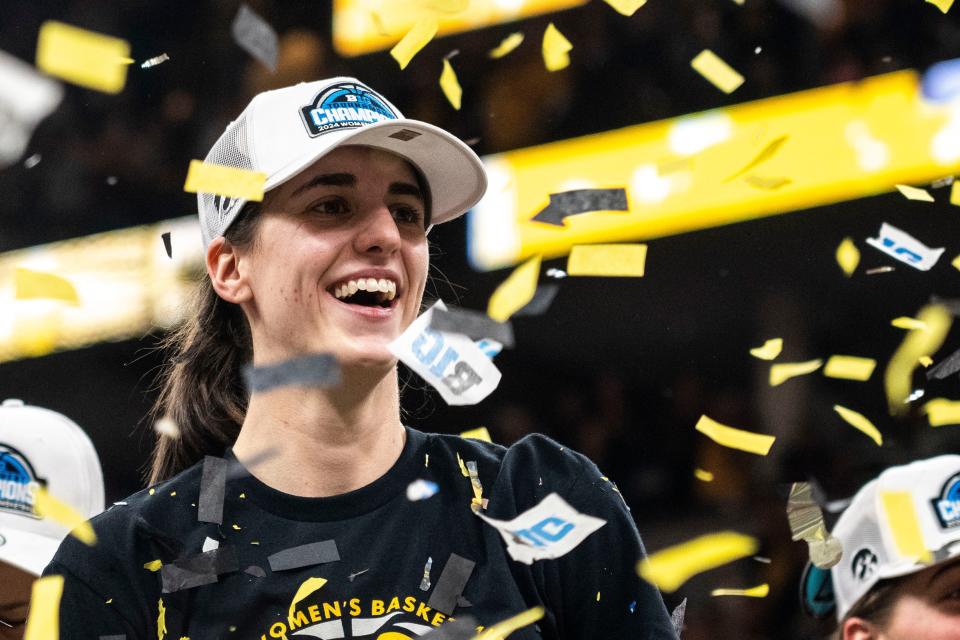 Caitlin Clark, shown after Iowa won the Big Ten Tournament title at the Target Center on March 10, is the most recognizable player in college basketball this season, according to a poll.