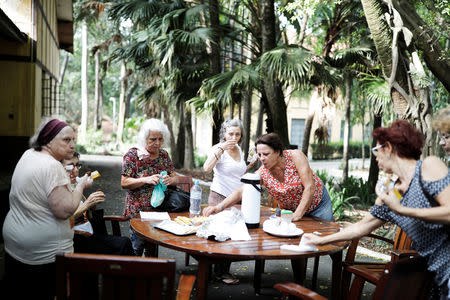 Senior citizens have a snack at Agua Branca park in Sao Paulo, Brazil, February 20, 2019. REUTERS/Nacho Doce