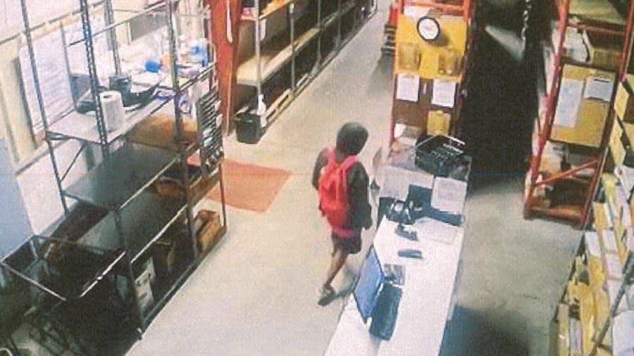 Suspect is scene on a surveillance camera inside of the store.