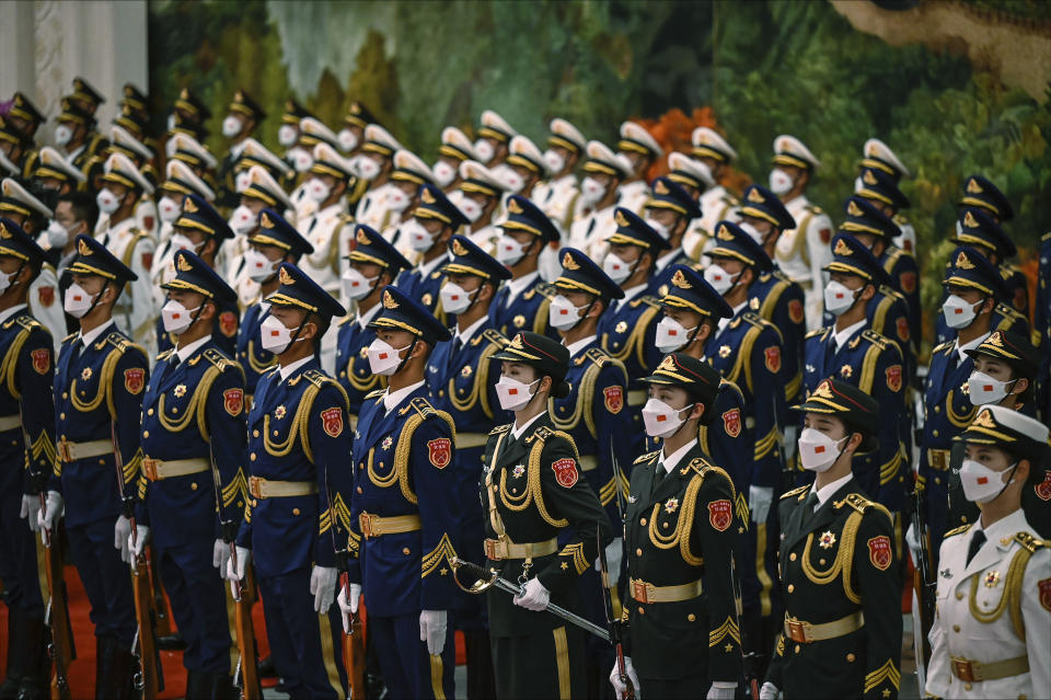 Chinese honor guards prepare for the arrival of Palestinian President Mahmoud Abbas and China's President Xi Jinping at the Great Hall of the People in Beijing Wednesday, June 14, 2023. (Jade Gao/Pool Photo via AP)