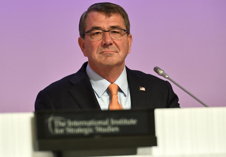 US Secretary of Defense Ashton Carter attends the first plenary session at the 14th Asia Security Summit, the International Institute for Strategic Studies (IISS) Shangri-La Dialogue, in Singapore, on May 30, 2015