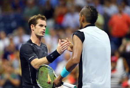 Sep 1, 2015; New York, NY, USA; Andy Murray of Great Britain (left) shakes hands with Nick Kyrgios of Australia (right) after their match on day two of the 2015 U.S. Open tennis tournament at USTA Billie Jean King National Tennis Center. Mandatory Credit: Jerry Lai-USA TODAY Sports