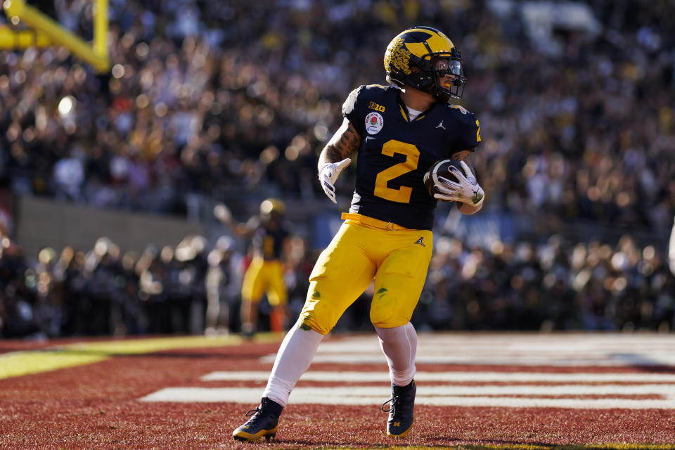 PASADENA, CALIFORNIA - JANUARY 01: Running back Blake Corum #2 of the Michigan Wolverines celebrates after scoring a touchdown during the CFP Semifinal Rose Bowl Game against the Alabama Crimson Tide at Rose Bowl Stadium on January 1, 2024 in Pasadena, California. (Photo by Ryan Kang/Getty Images)