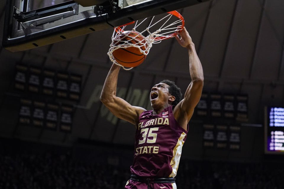 FILE - Florida State guard Matthew Cleveland (35) gets a dunk against Purdue during the first half of an NCAA college basketball game in West Lafayette, Ind., Tuesday, Nov. 30, 2021. The Seminoles return their top two scorers in guards Caleb Mills (12.7 points) and Matthew Cleveland (11.5 points). (AP Photo/Michael Conroy, File)