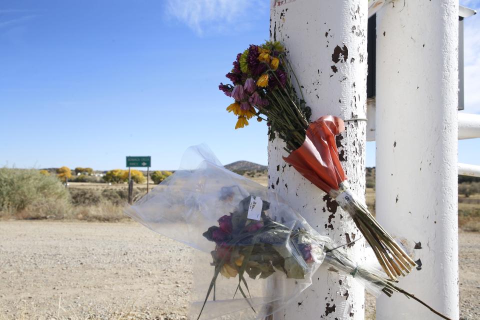 Flowers were left on the main sign for Bonanza Creek Ranch on County Road 45 south of Santa Fe, New Mexico on Oct. 22. The movie, "Rust," had been filming at the ranch when Cinematographer Halyna Hutchins and Director Joel Souza were shot on set. Hutchins later died from the injury.