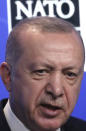 Turkey's President Recep Tayyip Erdogan speaks during a media conference at a NATO summit in Brussels, Monday, June 14, 2021. U.S. President Joe Biden is taking part in his first NATO summit, where the 30-nation alliance hopes to reaffirm its unity and discuss increasingly tense relations with China and Russia, as the organization pulls its troops out after 18 years in Afghanistan. (Yves Herman, Pool via AP)