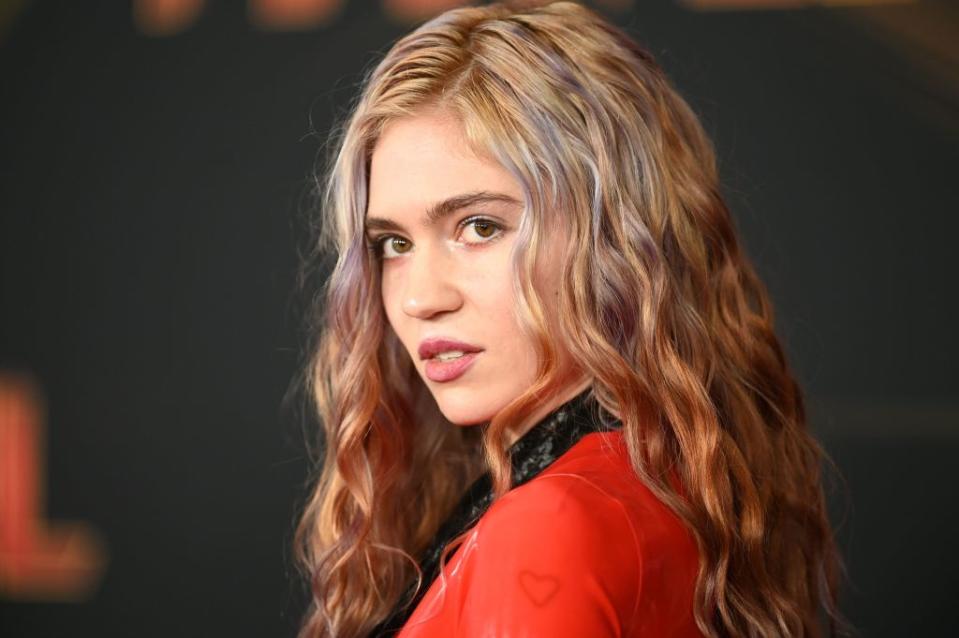 Canadian singer Grimes has revealed the meaning behind her son's unusual name, pictured her at the Captain Marvel premiere in March 2019. (Getty Images)