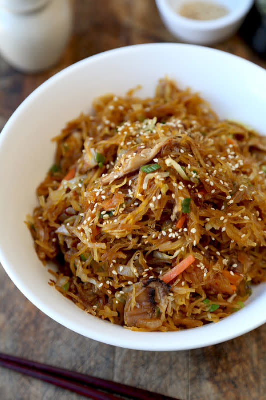 <p>Pickled Plum</p><p>This Yakisoba spaghetti squash recipe is so delicious, you won’t miss the noodles at all! This is a healthy and yummy substitute for carbs!</p><p><a href="http://www.pickledplum.com/yakisoba-spaghetti-squash-recipe/" rel="nofollow noopener" target="_blank" data-ylk="slk:Get the recipe here!;elm:context_link;itc:0;sec:content-canvas" class="link rapid-noclick-resp"><em><strong>Get the recipe here!</strong></em></a></p>