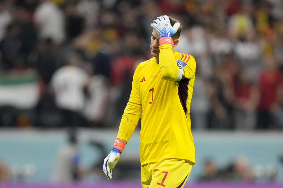 Germany's goalkeeper Manuel Neuer reacts at the end of the World Cup group E soccer match between Spain and Germany, at the Al Bayt Stadium in Al Khor , Qatar, Sunday, Nov. 27, 2022. The match ended in a 1-1 draw. (AP Photo/Matthias Schrader)