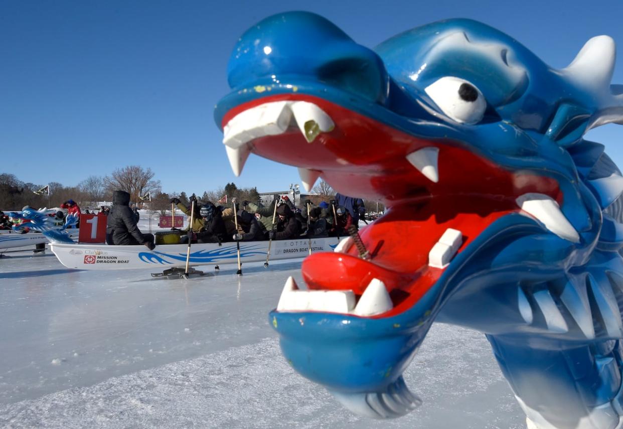 For the second year in a row, the Ottawa Ice Dragon Boat Festival races were cancelled because of the warm weather. It's prompting questions about the festival's future in a changing climate.  (Justin Tang/The Canadian Press - image credit)